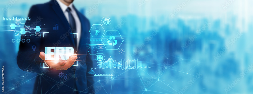 Obraz premium ERP: Businessman holding ERP icon. Digital technology era of future. Integrating technology of deep learning, business process optimization, real-time data, collaboration concept.