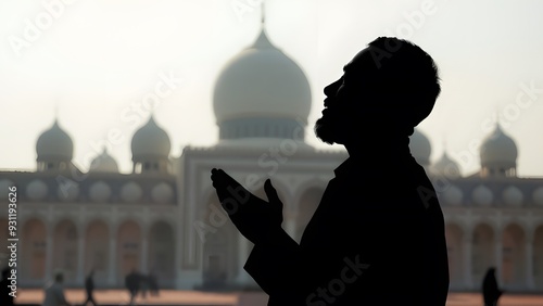 Silhouette of a Muslim making an invocation. 