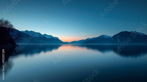 Tranquil dawn lake scene, serene ambiance