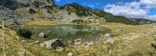 Panoramic view of Vidal lake in the Parang mountains, Romania.  photo