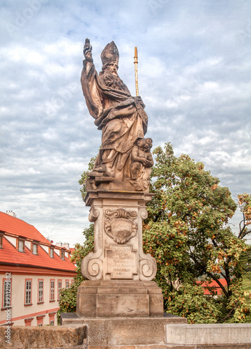 Statue of Saint Augustinus, Charles Bridge. Prague, Czech Republic. photo