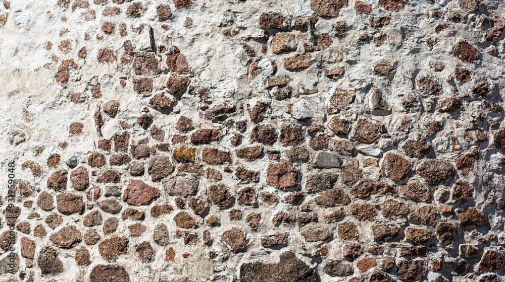 Texture of an old antique stone wall. Background for design. Texture of an old antique stone wall. Background for design.