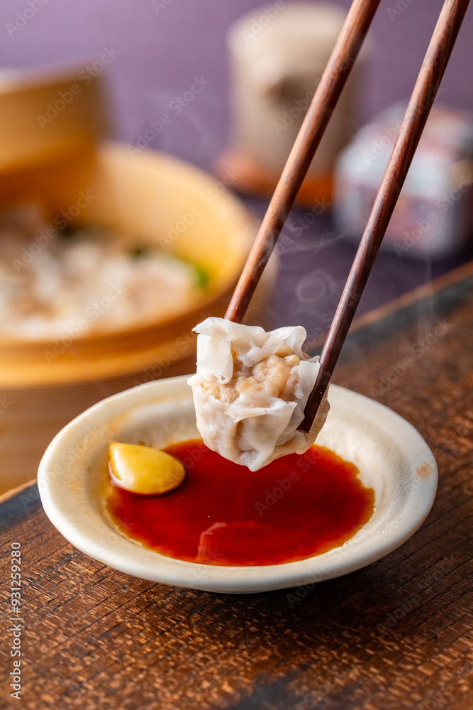 Siu Mai - Chinese steamed pork dumplings.
Image of a delicious Siu Mai.
Siu Mai - Chinese steamed pork dumplings.
Image of a delicious Siu Mai.
