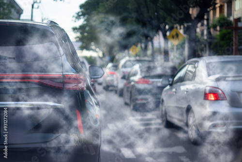 Air pollution from car exhaust smoke traffic in the city. Reducing global warming pollution and carbon dioxide from engine combustion. photo