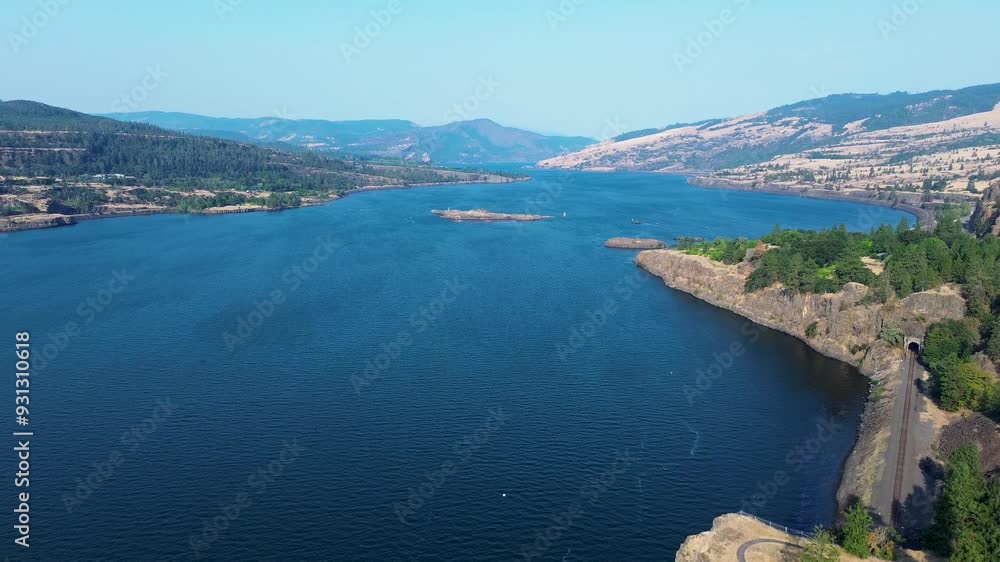 Drone aerial landscape of lake inlet valley of Columbia river gorge in Lyle Washington Oregon border town nature cliffs mountains countryside USA America travel tourism history Drone aerial landscape of lake inlet valley of Columbia river gorge in Lyle Washington Oregon border town nature cliffs mountains countryside USA America travel tourism history