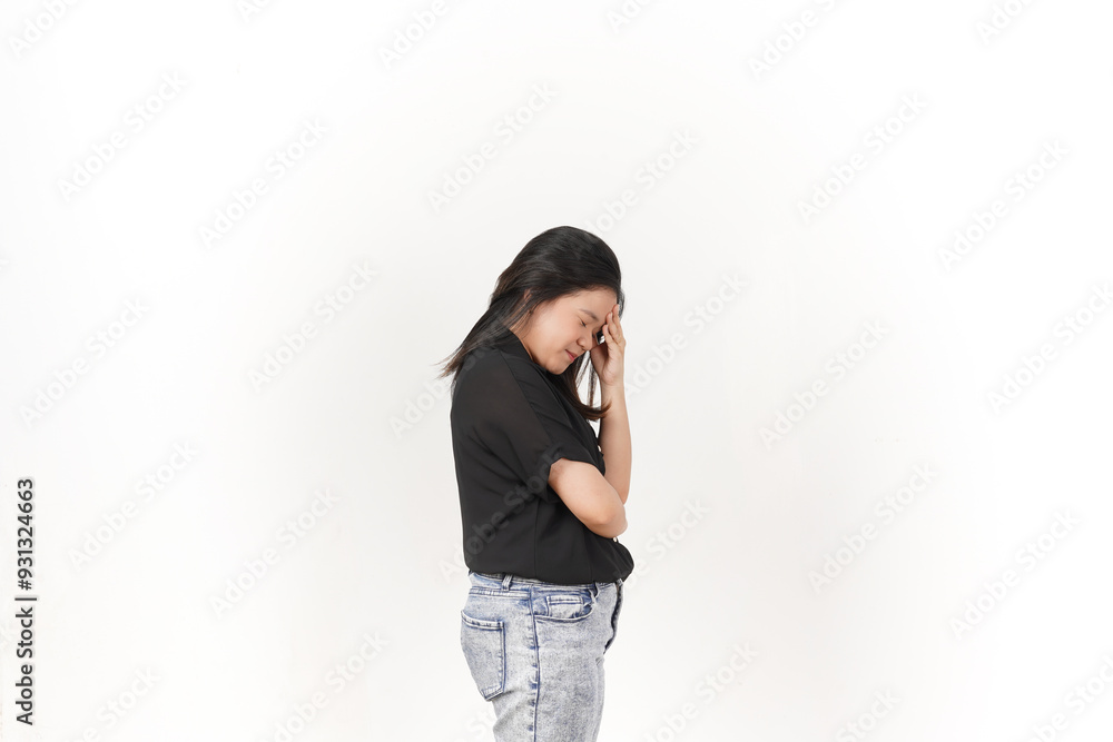 Young Asian woman Suffering Headache wearing Black t-shirt and jeans isolated on white background Young Asian woman Suffering Headache wearing Black t-shirt and jeans isolated on white background