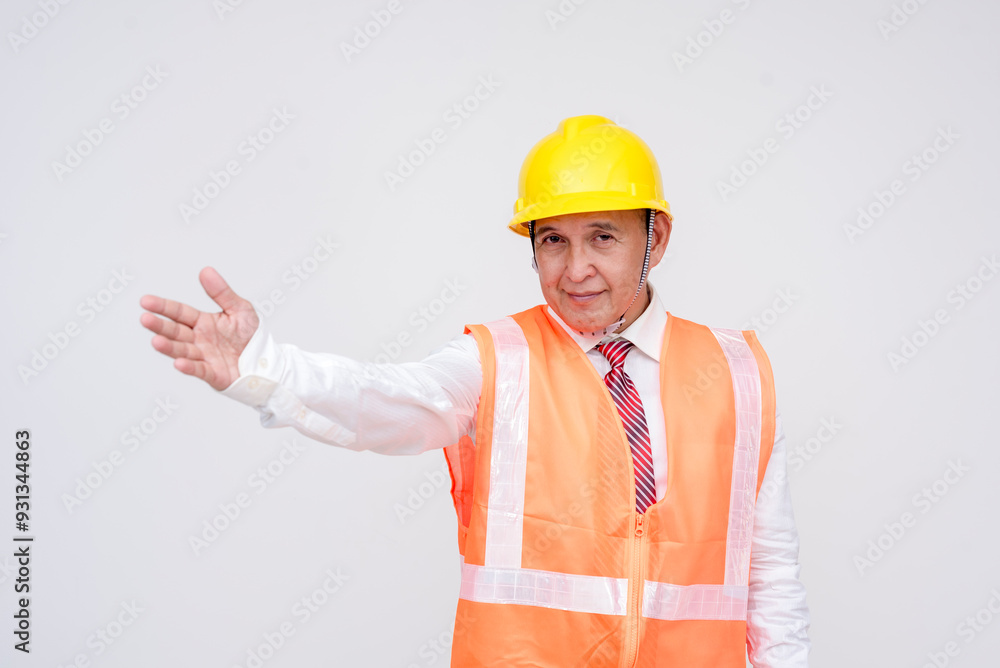 A middle aged asian construction project manager, or engineer wearing a safety hat and vest presenting something to the left with his hand. For editing purposes. Isolated on a white background. A middle aged asian construction project manager, or engineer wearing a safety hat and vest presenting something to the left with his hand. For editing purposes. Isolated on a white background.