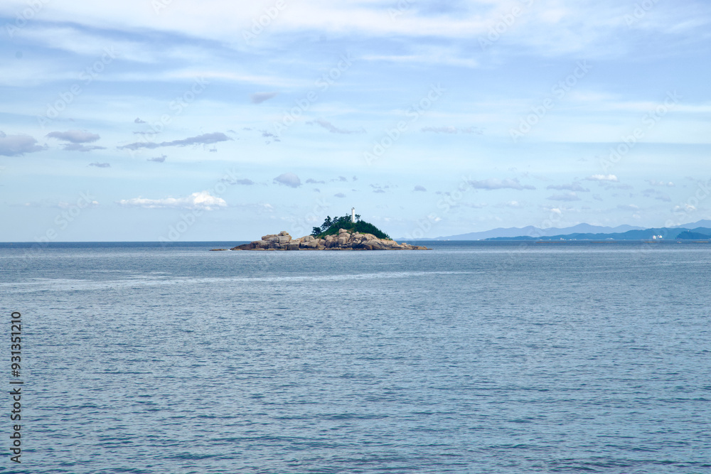 Jodo Island with Lighthouse in the East Sea Jodo Island with Lighthouse in the East Sea