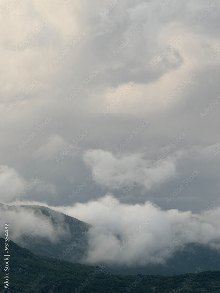 Fototapeta premium clouds over the mountains