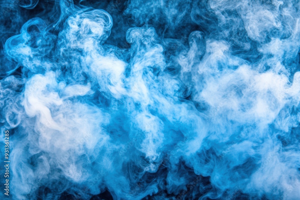 Soft blue swirling smoke patterns on dark background Soft blue swirling smoke patterns on dark background