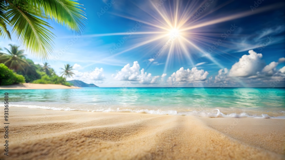 Obraz premium Blurry tropical beach background with soft sand, sparkling sea water, and rays of sunshine , Summer, vacation, nature