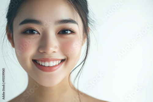 Asian woman positive smile on white background, beauty positive smile