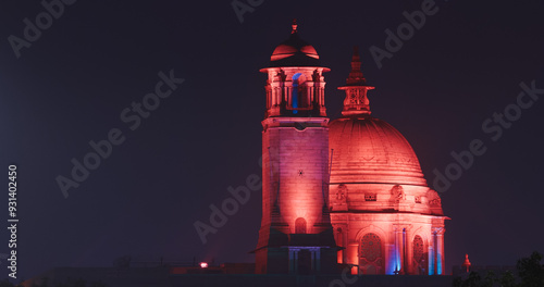 Obraz na płótnie New Delhi, Delhi, India. Close up of Rashtrapati Bhavan, Bell tower and Ministry of External Affairs in Kartavya Path, Rajpath Area. Rashtrapati Bhavan in evening night illumination lights lighting w salonie