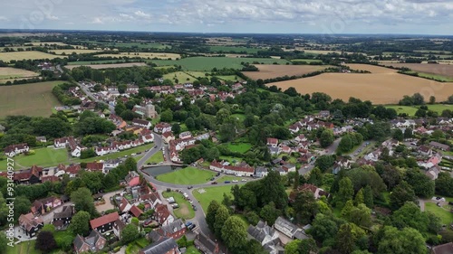 Pull back drone aerial reverse reveal Finchingfield Village in Essex UK photo