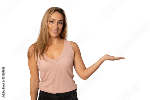 Smiling woman presenting with open hand holding something blank isolated on a white background