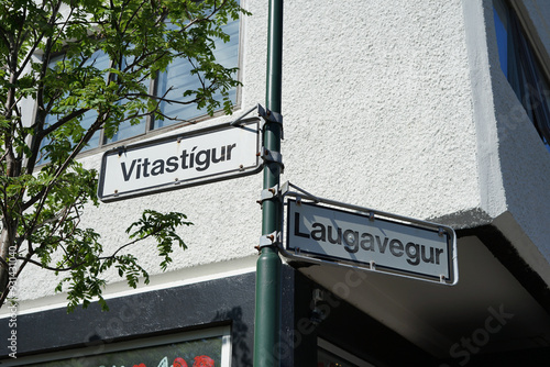 Reykjavik, Iceland - Vitastigur and Laugavegur crossing main street name sign in district Miðborg Austurbær