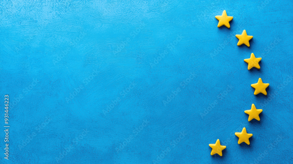 Yellow stars arranged on a blue background, representing the European flag or a concept of rating, review, and excellence. Yellow stars arranged on a blue background, representing the European flag or a concept of rating, review, and excellence.