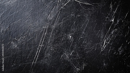 High-resolution black paper texture with visible white scratches and scuffs