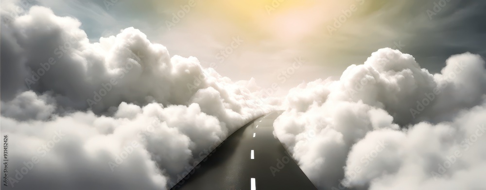 Road through the clouds with a bright sun shining down. Road through the clouds with a bright sun shining down.