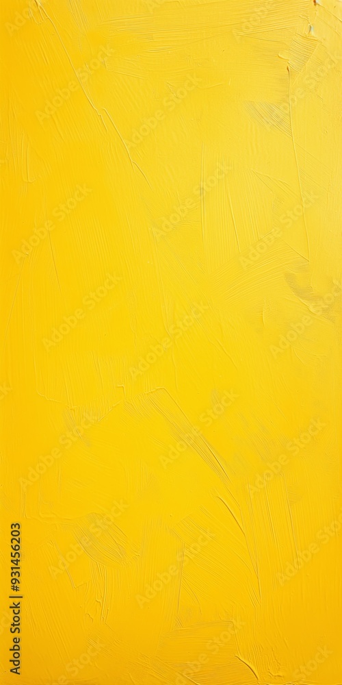 Obraz premium Rough yellow paint strokes on a stucco wall, showcasing a bright and textured abstract design.