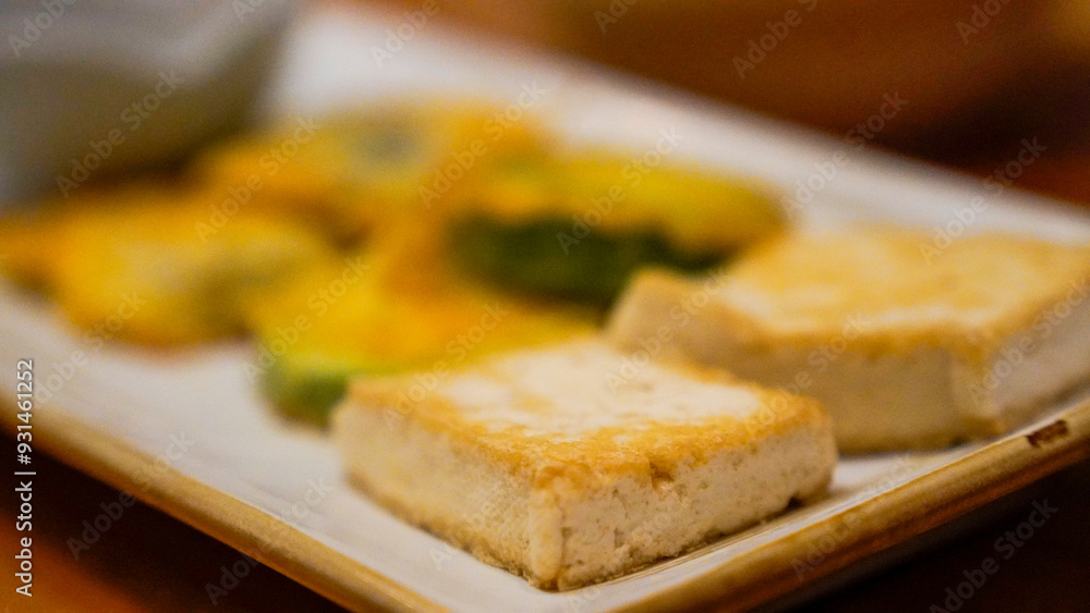 Tofu and pumpkin baked in a frying pan Tofu and pumpkin baked in a frying pan