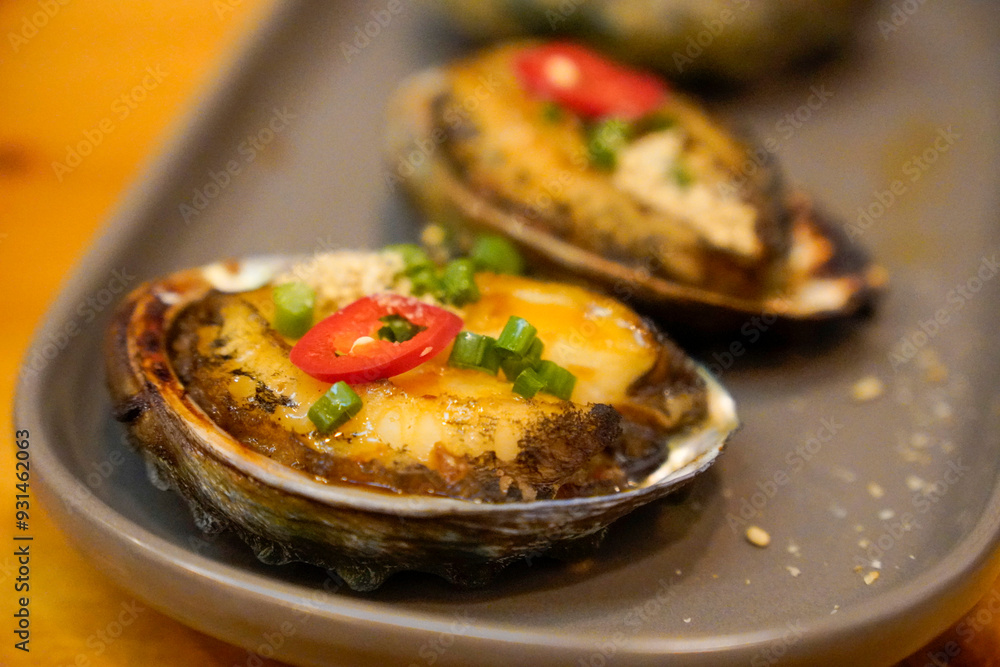 a baked abalone dish a baked abalone dish