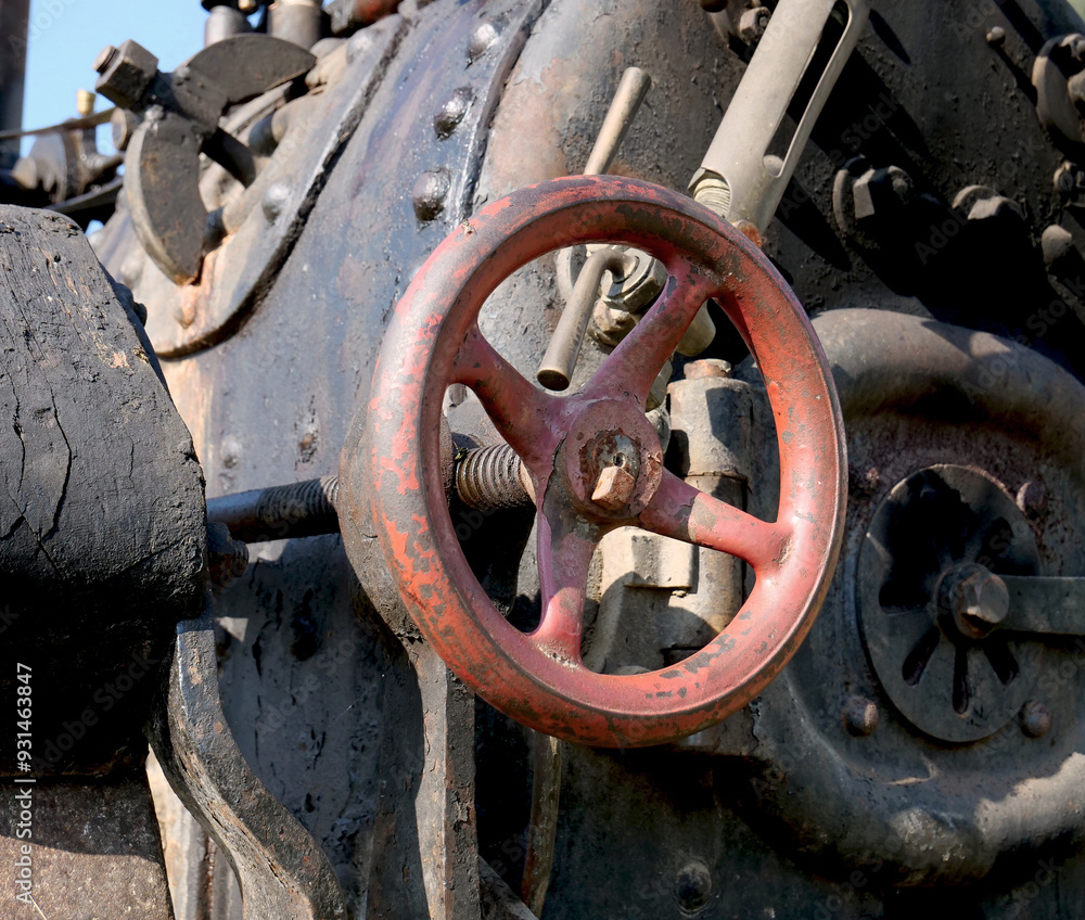 Valves and knobs of an old agricultural steam engine Valves and knobs of an old agricultural steam engine