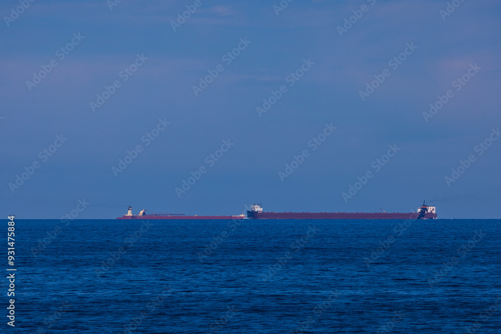 Obraz premium Two Ships Passing Each Other On Lake Superior