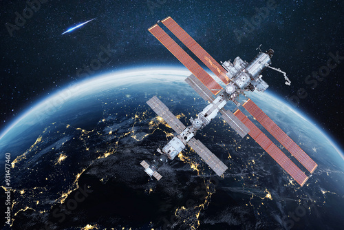 Fototapeta Naklejka Na Ścianę i Meble -  The ISS flies near blue night planet Earth. Space mission and space exploration. Communications and technologies in Earth orbit