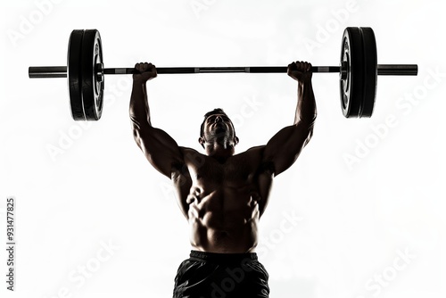 A muscular bodybuilder lifts heavy weights, showcasing strength and determination in weightlifting training at a gym. photo