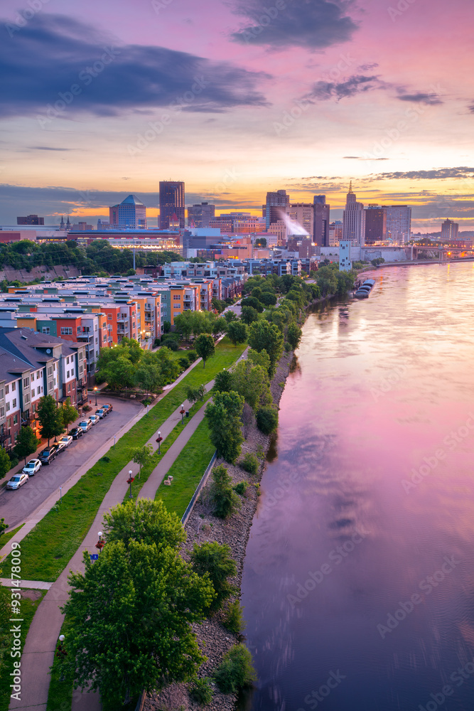 Saint Paul, Minnesota, USA. Aerial cityscape image of downtown St. Paul, Minnesota, USA with reflection of the skyline in Mississippi River at beautiful summer sunrise.