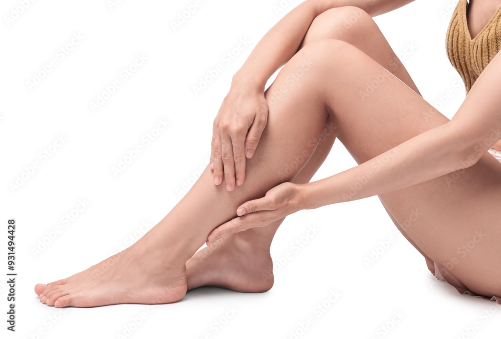 Woman touching her smooth legs on white background, closeup Woman touching her smooth legs on white background, closeup