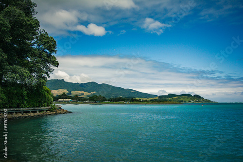 View over holiday park across sheltered bay at Tawatahi River. Raglan, New Zealand photo