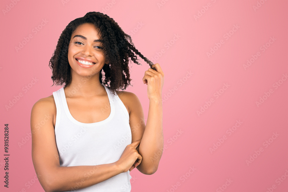 Beautiful African American Woman Playing With Her Curly Hair, Smiling At Camera Isolated Over White Background Beautiful African American Woman Playing With Her Curly Hair, Smiling At Camera Isolated Over White Background