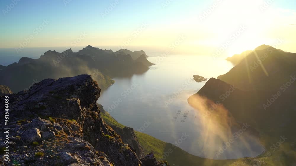 Clouds and the midnight sun from summit Keipen on Senja, Norway. Clouds and the midnight sun from summit Keipen on Senja, Norway.