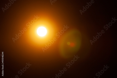 Sun flare on the black background