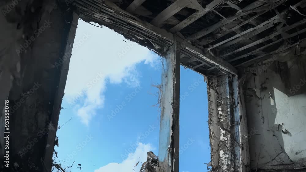 Post-Fire Desolation: Interior of a Building with Burnt Walls Post-Fire Desolation: Interior of a Building with Burnt Walls