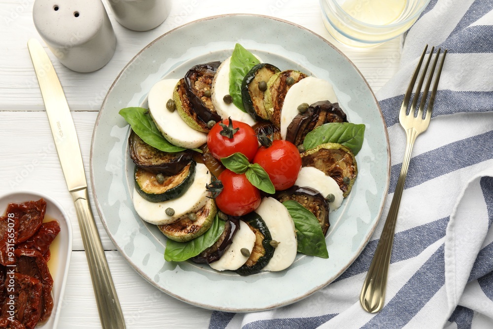 Tasty salad with grilled vegetables and mozzarella cheese served on white wooden table, flat lay Tasty salad with grilled vegetables and mozzarella cheese served on white wooden table, flat lay