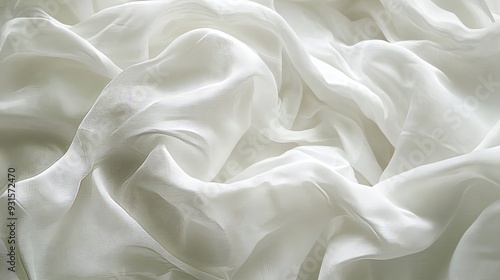 Wallpaper Mural Artistic macro image of crumpled white fabric, showcasing the fine details and soft texture with gentle lighting for a serene and elegant background. Torontodigital.ca