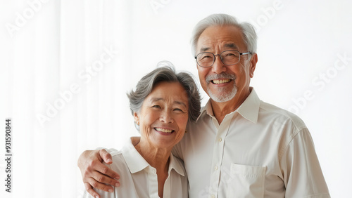 Happy older couple on white