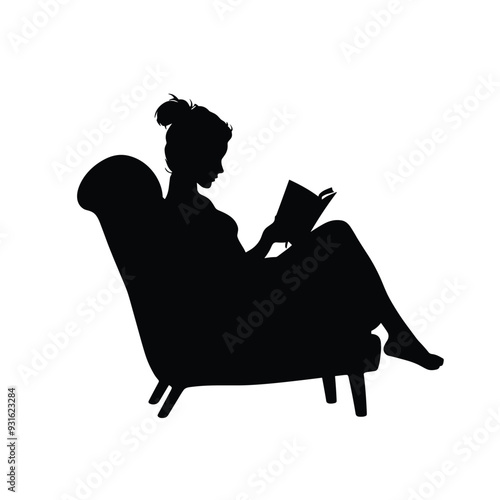 Silhouette of a woman reading a book while seated in an armchair.
