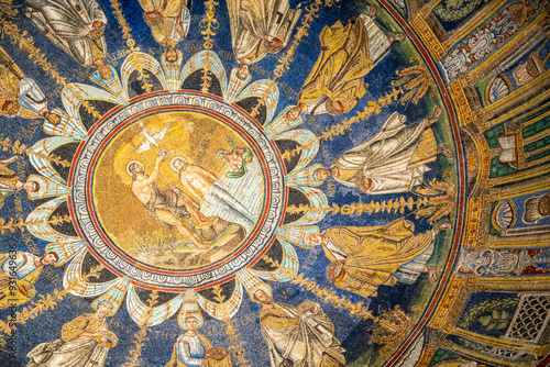 Beautiful mosaic in the dome ceiling of a church in Ravenna representing Saint John baptizing Jesus