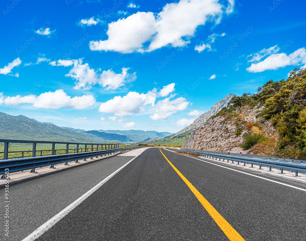 Fototapeta premium Countryside highway in a beautiful mountainous area.