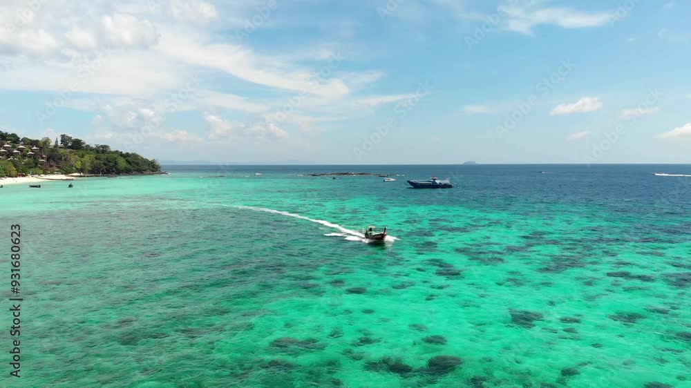 Swimming longtail, waves, speed, turquoise clear water, coral reef, sky, islands. Seascape, aerial photography, speed boat, tourist destination, exploration, environment, beautiful nature. High Swimming longtail, waves, speed, turquoise clear water, coral reef, sky, islands. Seascape, aerial photography, speed boat, tourist destination, exploration, environment, beautiful nature. High