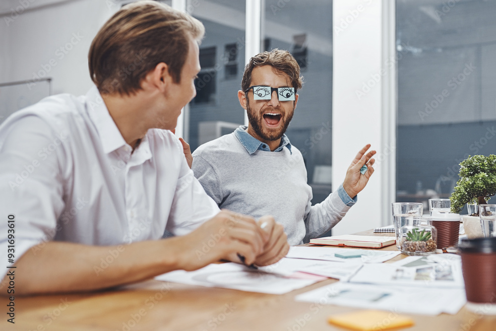 Obraz premium Office, team and funny business men in meeting with eye stickers on glasses for joke in creative startup. Laughing, comic and happy employees together with crazy, silly friends and comedy discussion