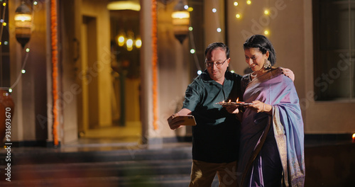 Photography Indian Asian Hindu happy elder old gen x couple hold phone use cam look cute tak