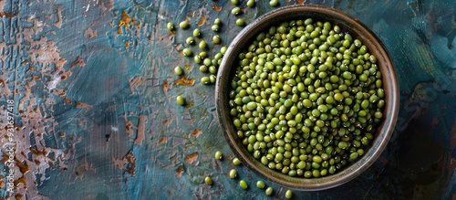 Raw green mung beans on a dish. with copy space image. Place for adding text or design photo