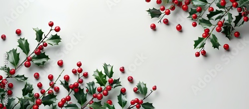 Arrangement of red holly be...