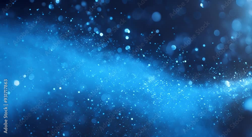 Blue sparkling dust particles scattered across a dark space, creating a mesmerizing and ethereal cosmic effect with bokeh highlights. Blue sparkling dust particles scattered across a dark space, creating a mesmerizing and ethereal cosmic effect with bokeh highlights.