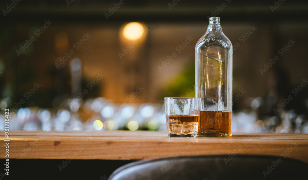 Whiskey drinks at the bar celebrating a special event in a luxury bar. Close-up shows a cheerful atmosphere as glasses clink together, reflecting a lively and joyful gathering. Whiskey drinks at the bar celebrating a special event in a luxury bar. Close-up shows a cheerful atmosphere as glasses clink together, reflecting a lively and joyful gathering.